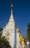 Wat Phrathat Si Chom Thong is famed for its sacred relic of the Buddha. The relic, found in 1492, is supposed to be a fragment of the Buddha's right cranium and is kept in the viharn rather than the attractive gold chedi that dominates the site. The chedi was erected in 1452.
