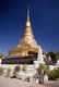Thailand: The gilded chedi and viharn of Wat Phra That Chae Haeng, Nan, North Thailand